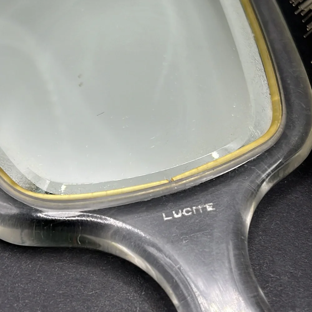 Vintage vanity lucite mirror and hair brush set